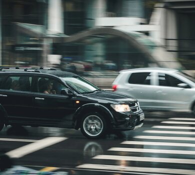 black-suv-beside-grey-auv-crossing-the-pedestrian-line-125514