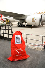 Emirates SkyCargo has designed a striking 'Must Go' bag to alert staff to the urgent nature of shipments.jpg