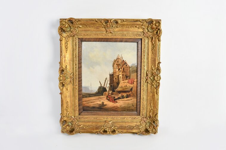 Zdjęcie. Obraz z ramą. Na obrazie widok na dom, statek oraz dwie postacie. 