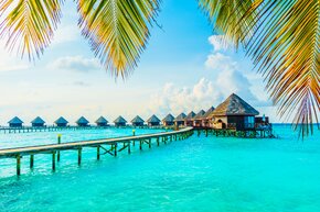 beautiful-tropical-resort-hotel-and-island-with-beach-SOURCE.jpg