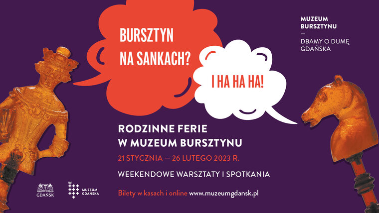 Grafika "Bursztynek na sankach". Na pierwszym planie figury szachowe z bursztynu - król i skoczek. 