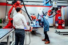 Medium_MS PPT_MS Word_Newsletter-Two men test manufacturing wlding robotics.jpg