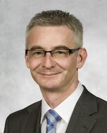 Dr  Giles Wilson