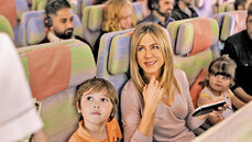 Jennifer Aniston and her young co-star Cooper onboard the A380 in the new Emirates TVC (2).jpg