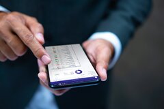 man-hand-mobilephone-george-screen-english
    