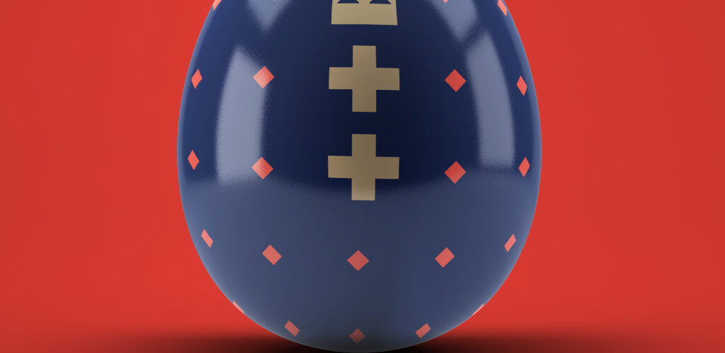 Grafika przedstawia granatowe jajko. Wewnątrz od góry korona i poniżej dwoma krzyżami. Poniżej napis Wesołych Świąt!